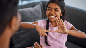 a little girl ASL American Sign Language